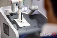'이제 초상화도 로봇이 그리네'